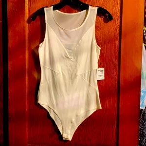 Cream body suit ; 1/2 mesh